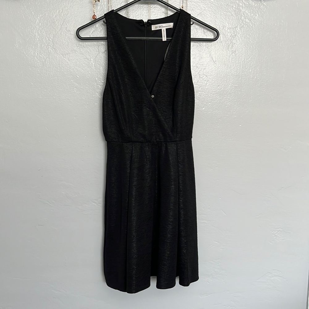 Cute semi formal black minidress, size 0 and runs small in the chest